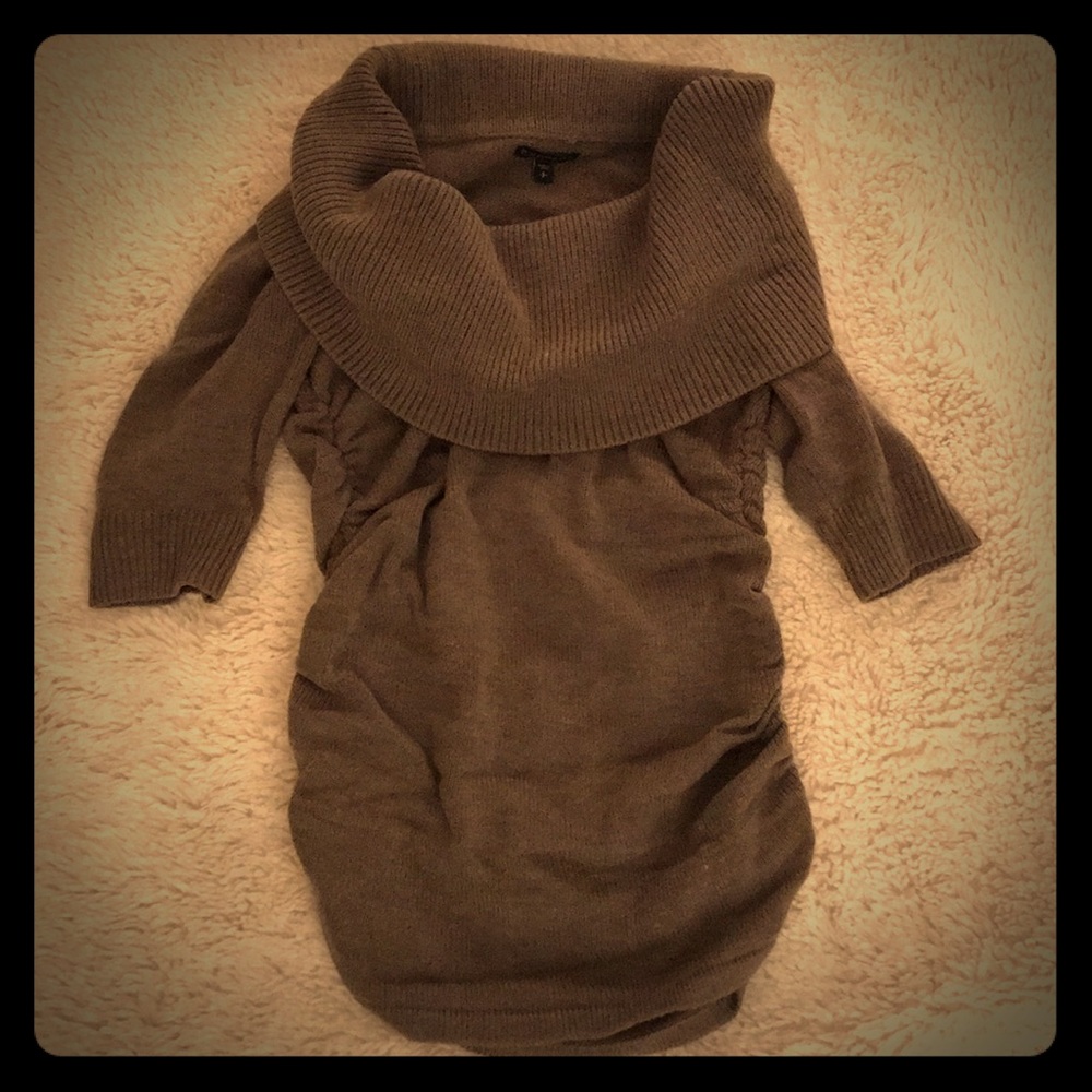 Tan sweater cinched on sides